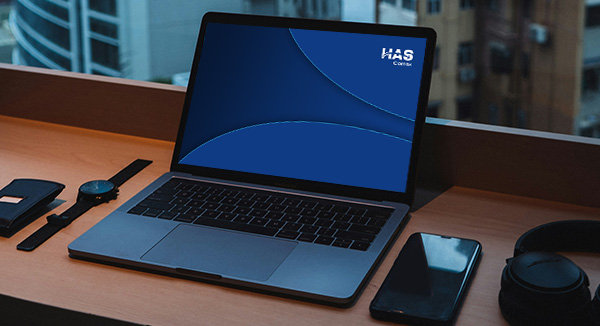 Wallpaper HAS Comex aplicado em laptop
